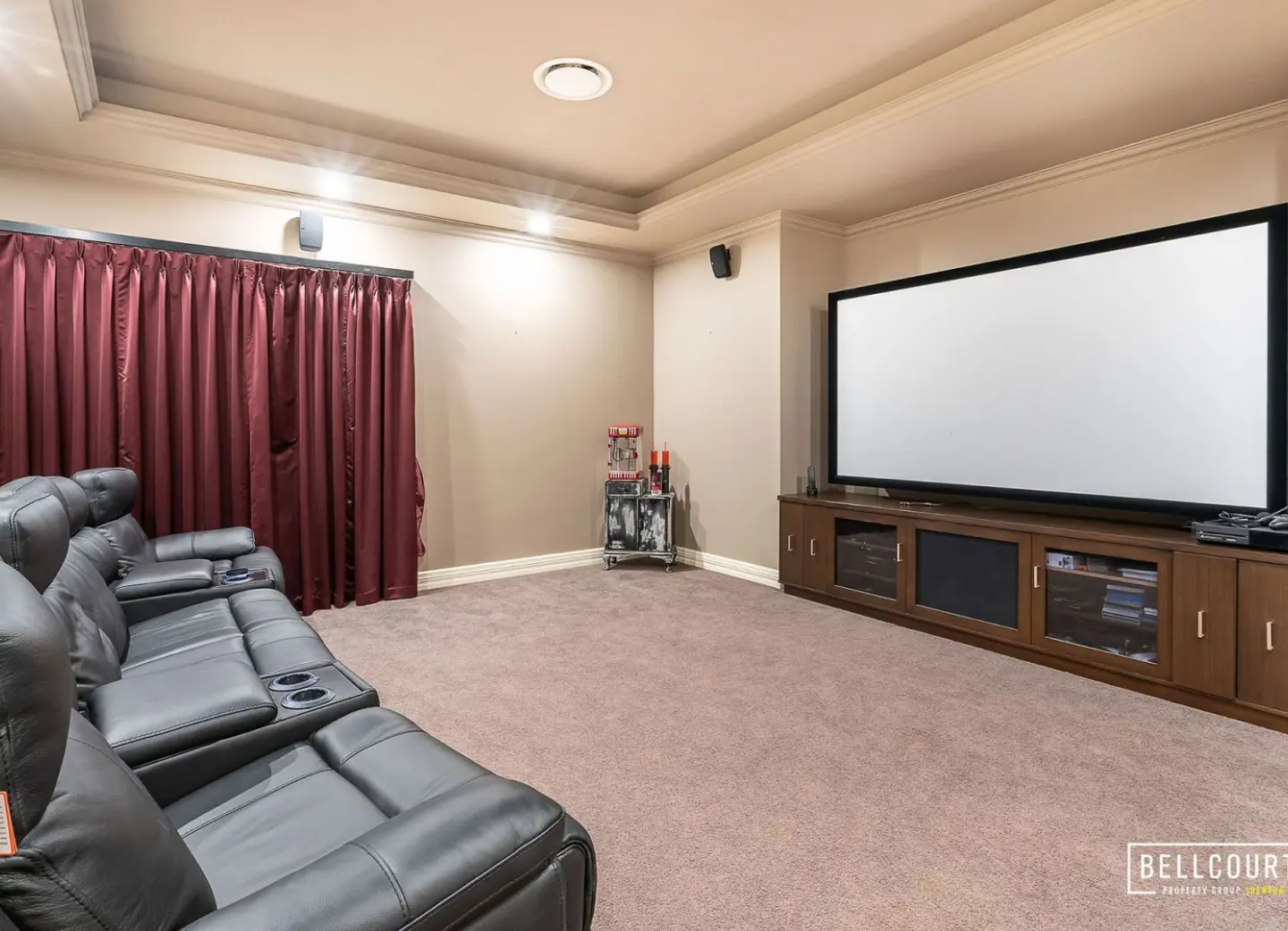 Home movie room with theater sofa